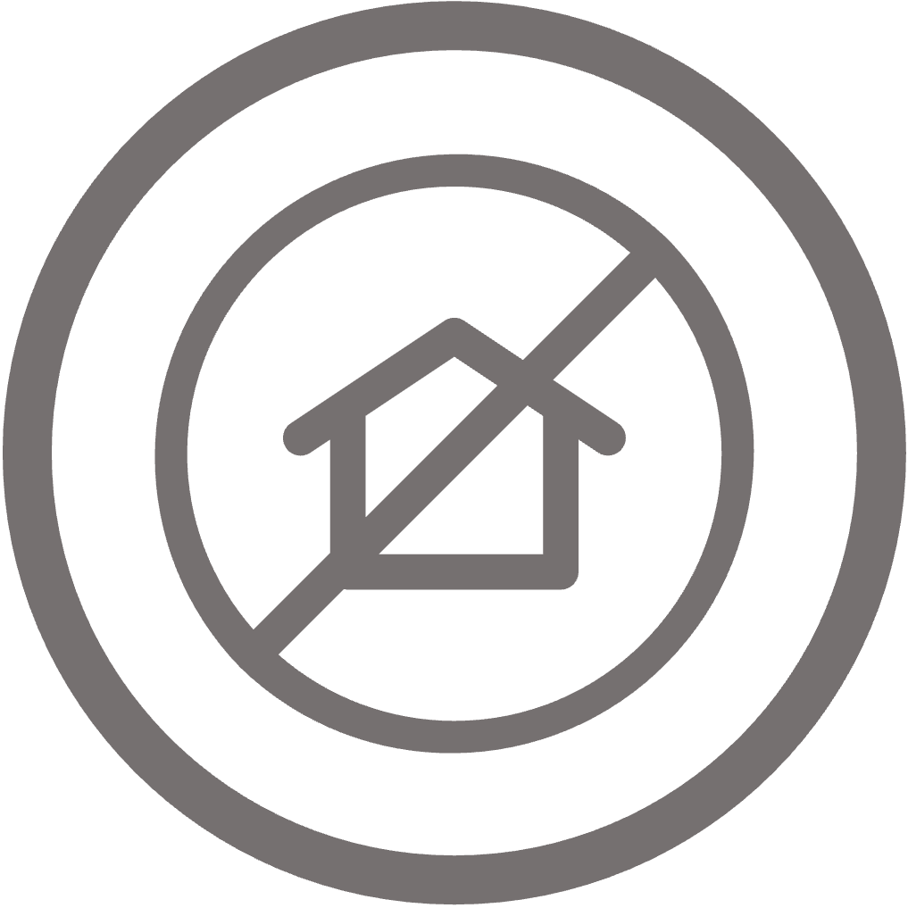 Circular icon of a home crossed out