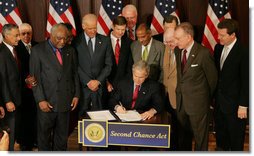 Photo of President Bush signing the SCA